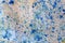 Abstract blue color spill on old fabric texture background. close up