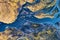 Abstract blue glacier rivers pattern flowing through volcanic moss field in Icelandic highlands on summer