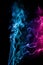 Abstract blue pink colored smoke flowed on black background