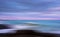 Abstract blue pink ocean sunset surf shoreline ICM blur streaked seascape