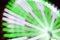 Abstract blur background of large Ferris wheel green lights