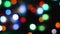 Abstract blur bokeh background. Colorful defocused bokeh background. Soft color blur on a black background. Beautiful colored boke