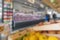 Abstract blur and defocus shopping mall in department store interior for background. Walls of the shop modern vintage