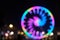 Abstract blur and defocused ferris wheel on night