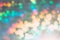 Abstract blurred background for layouts. On a gray background multi-colored spots in the defocus.