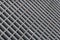 Abstract blurred diagonal lattice background from metal