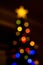 Abstract blurred disfocused Christmas lights and tree background