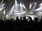 Abstract blurred image. Crowd during a entertainment public concert a musical performance. Hand fans in fun zone people