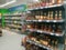 Abstract blurred image. Defocused lens. Wine, cognac and other alcoholic beverages on the shelves in the supermarket