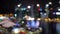 Abstract blurred light with office building and reflection night view on Singapore. changes focus to architecture of the