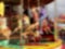 Abstract blurred people riding on carousel horse ride