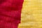 Abstract blurred red and yellow hemp fabric background