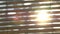 Abstract blurred sunlight goes through the window blinds.