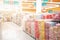 Abstract blurred supermarket aisle with rice bag of  shelves and many goods of food prepare for shopper