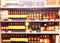 Abstract blurred supermarket store and refrigerators in department store. Interior shopping mall defocused background. Business fo