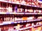 Abstract blurred supermarket store and refrigerators in department store. Interior shopping mall defocused background. Business fo