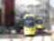 Abstract blurred yellow Trams in city
