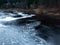 abstract blurry water texture, a steep river in the evening chair,