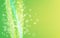 Abstract bokeh backdrop. Bright green background with defocused lights. Summer concept. Sunny theme for web or banner