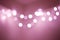 Abstract bokeh background of lights pink gold tone