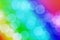 Abstract bokeh. Space for a copy. Shining rainbow background.