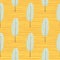 Abstract botanic seamless leaf pattern. Floral silhouettes in light blue color on yellow background with strips