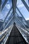 Abstract building interior, iron and glass walls with sky view