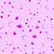 Abstract calm with an imitation lilac petals on a pink ba