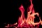 Abstract chemical pink fire flame isolated on black background