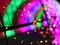 Abstract Christmas Bokeh rainbow blurred background, lightbulb on Christmas tunnel lights for celebrate season with red, green.