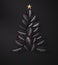 Abstract christmas tree made of black leaves