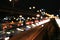 Abstract circular bokeh motion lens blur backround of city and street light or Bokeh light from car in street in night time. Bangk