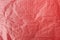 Abstract closeup wrinkle red paper texture background