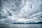 Abstract cloudy waterscape AND MOUNTAIN RANGE IN ALASKA