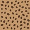 Abstract coffee beans pattern brown background