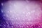 Abstract colorful background with purple and blue glittering light bubbles