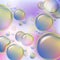 Abstract colorful bubbles rising on soft background. Drops of oil or cellular structure scientific background.