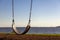 Abstract concept showing close up   empty swing seat