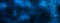 Abstract cosmic blue banner background with stars and nebulae