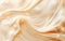 Abstract cream background with a swirling milk wave texture. Gradient splash pattern in satin ripple color,