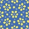 Abstract daffodil flowers vector seamless pattern background. Bright yellow mix of flower heads on blue backdrop. Hand