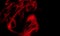 Abstract dark background. Red smoke. Science experiment concept. Premium image