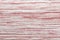 Abstract decorative background with wicker texture horizontal curved stripes in red and white