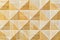 Abstract decorative ecological unpainted light wooden background with geomethrical mosaik wood pattern close-up, natural