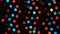 Abstract defocused colorful blinking lights. Christmas and New Year garland on a black background. Seamless loopable.