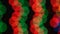 Abstract defocused colorful blinking lights. Christmas and New Year garland on a black background. Seamless loopable.