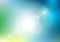 Abstract defocused summer background with white lens flare. Blue green color blurred backdrop. Spring vacation impression