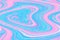 Abstract digital liquid marble or mixed acrylic paints effect in glowing neon pink and blue colors with swirly texture