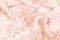 Abstract dusty blush liquid marble background with copper foil textured stripes. Pastel marbled alcohol ink drawing