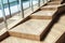 Abstract empty interior, wooden stairs, glass